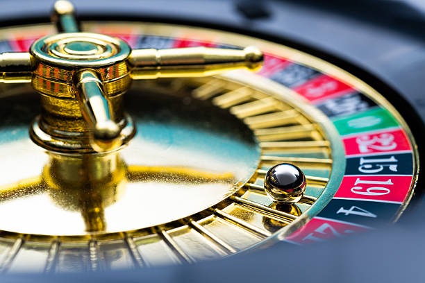 Mobile phone displaying csbola slot games and live dealer tables